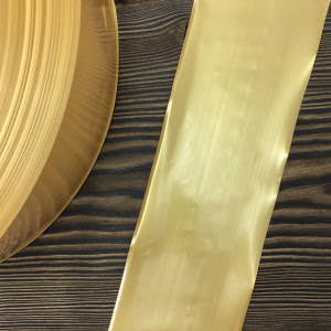 Поліамідна оболонка 65 мм золото — фото
